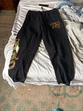 Stay Lucky Black Mens Sweatpants with Dragon Graphic